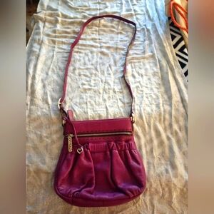 purple Brighton leather crossbody purse. Size is small. Beautiful clean bag!